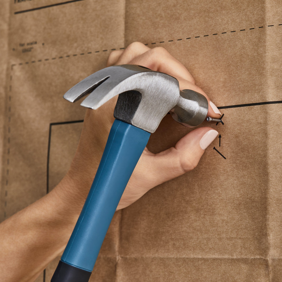 Hammer on nail