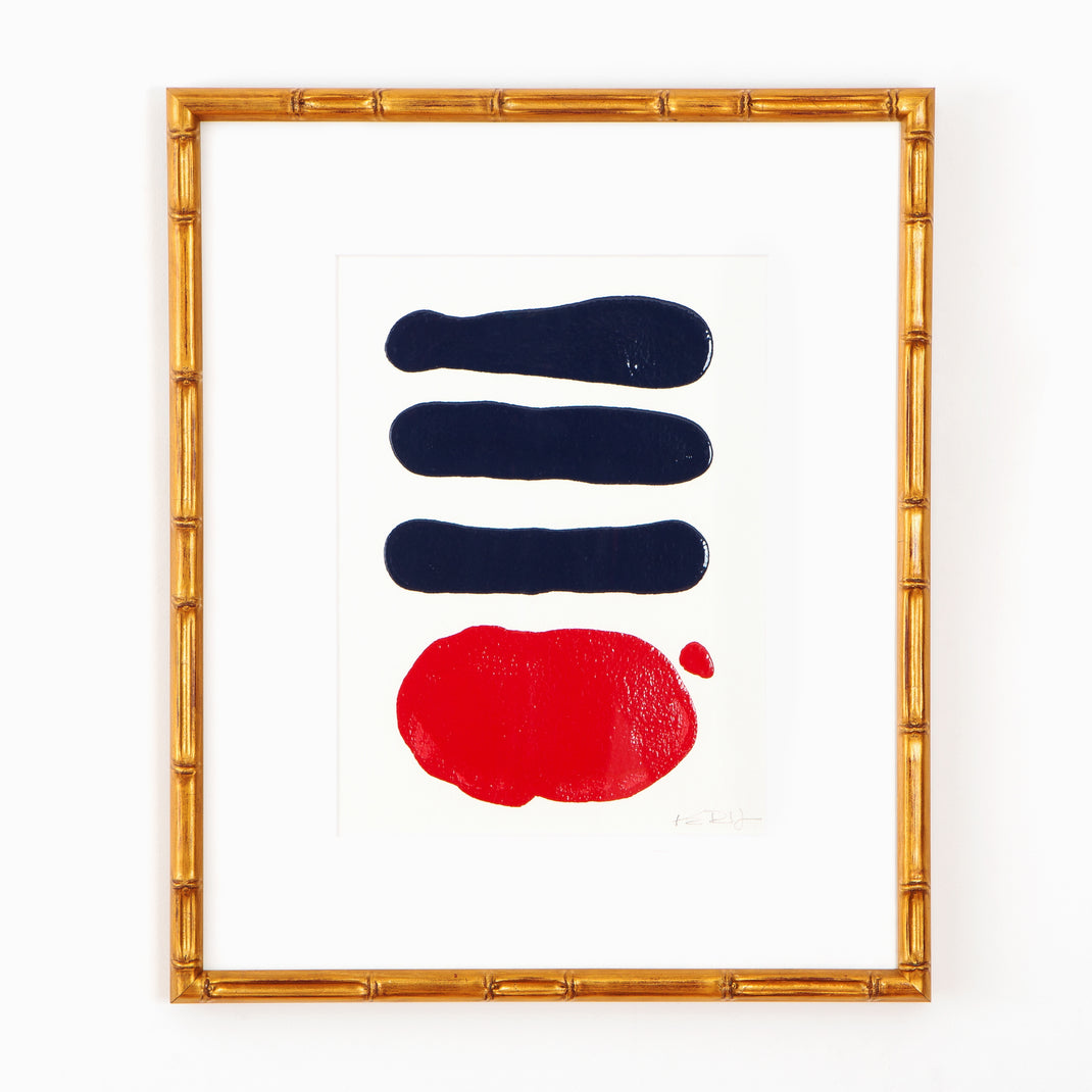 red and blue abstract art framed in Mandalay gold bamboo frame with a white mat