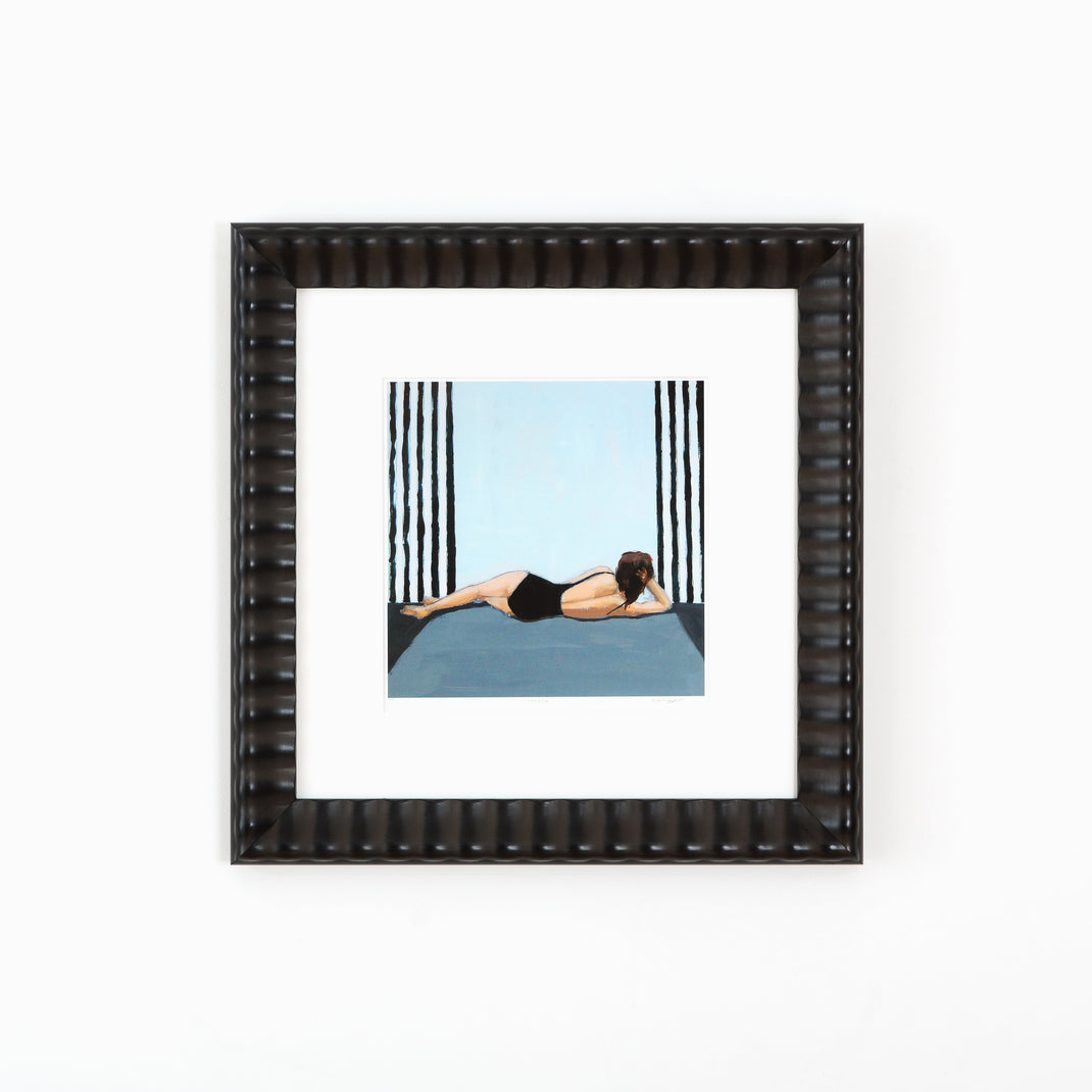 abstract photo of a woman lounging in a black bathing suit framed in rippled Rialto frame with a white mat