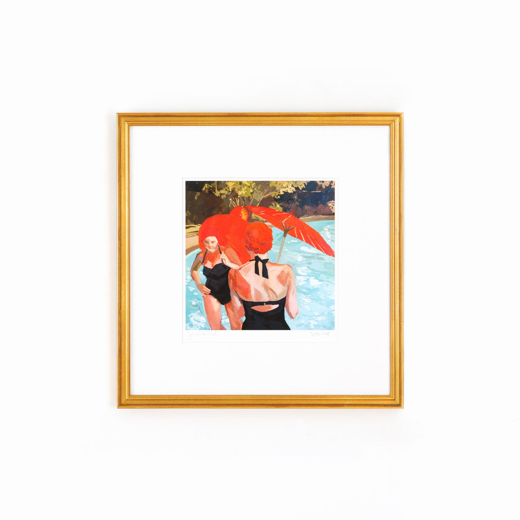 art print of women by a pool in vintage bathing suits framed in Richmond gold frame with a white mat